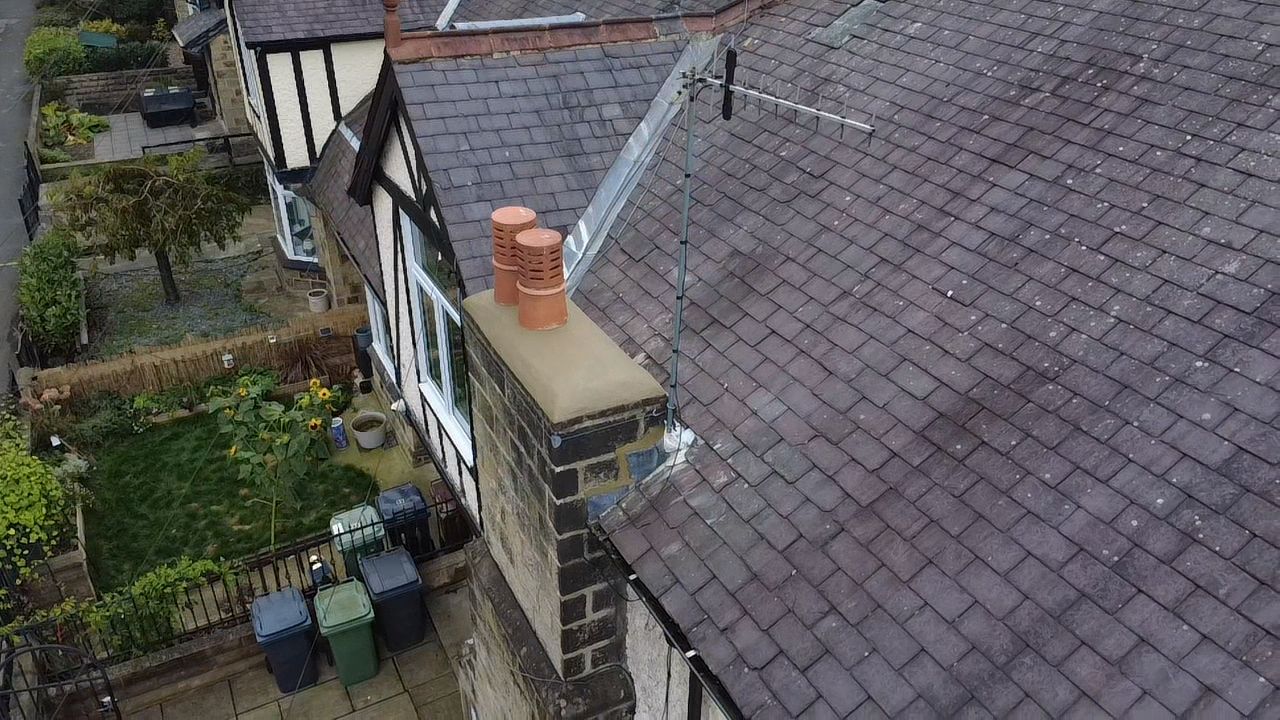 Chimney capped with ventilated cowl after repair