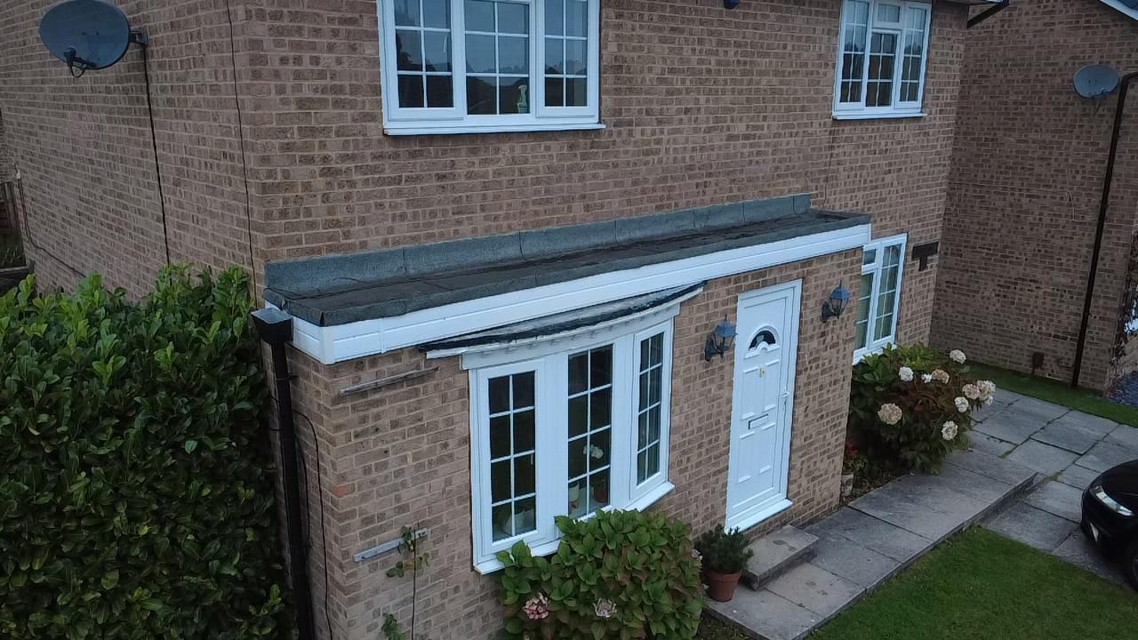 Flat roof replacement on a front porch