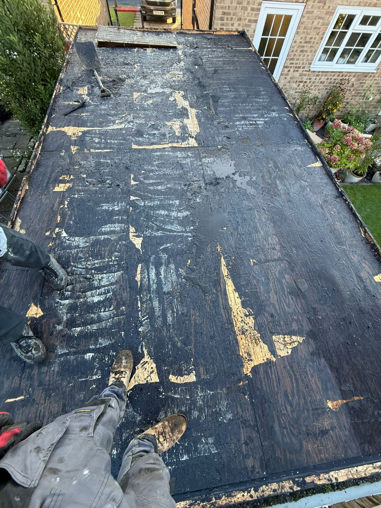 Old flat roof stripped back to deck for replacement
