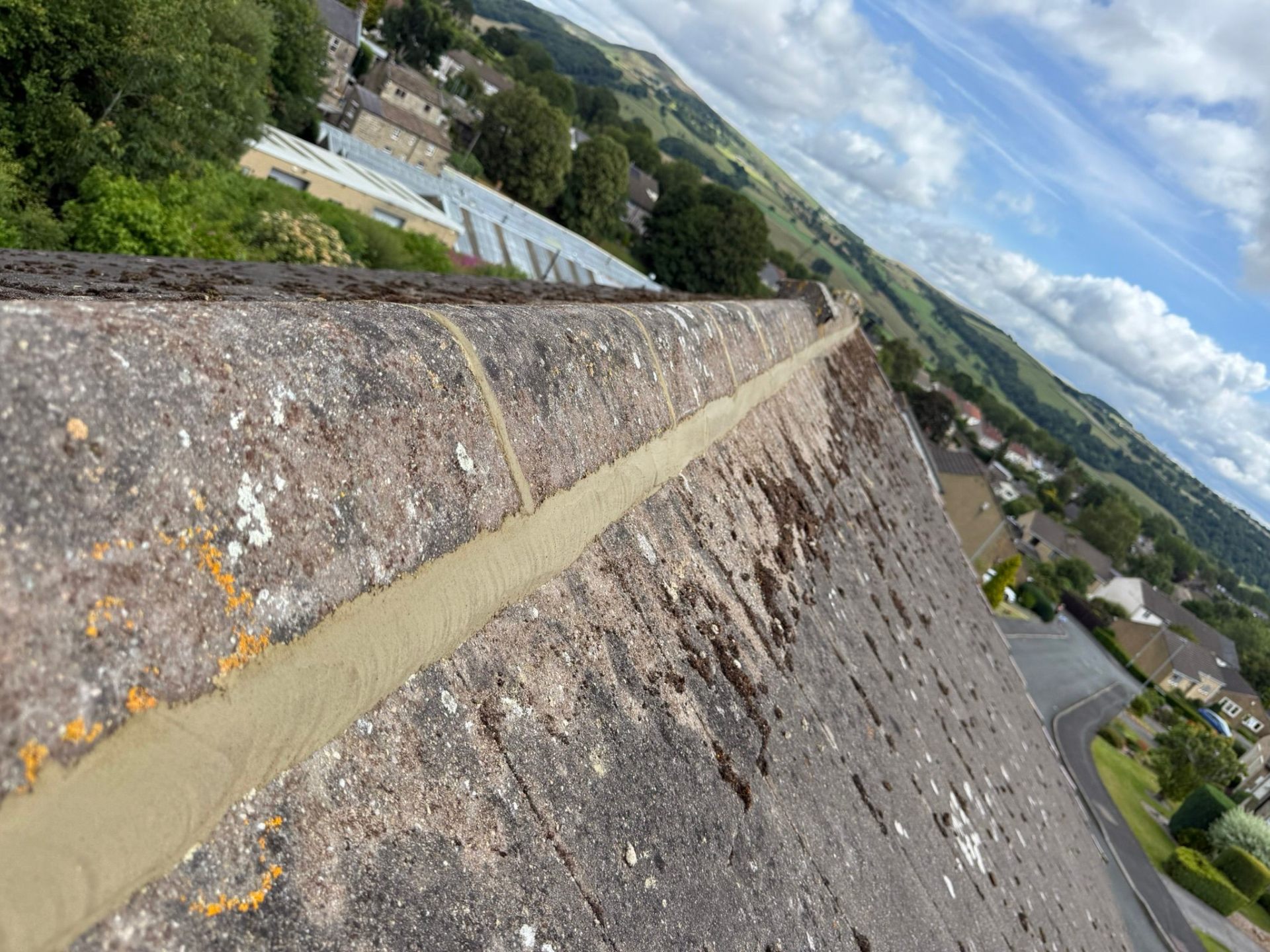 Ridge and valley repointing on a pitched roof