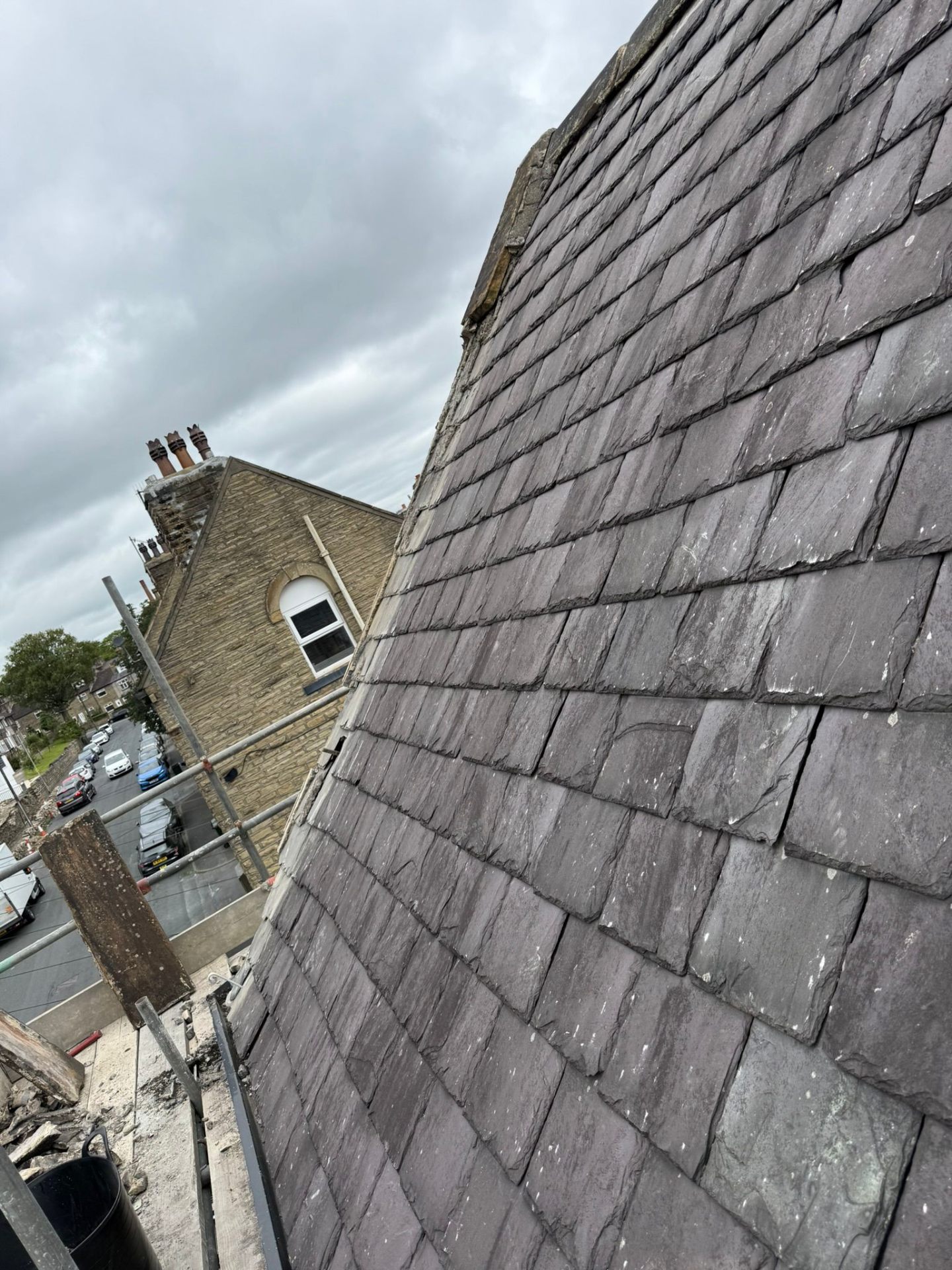 Close-up of slate tiles with lead soakers